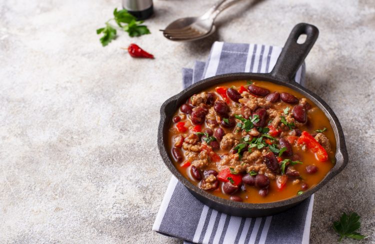 Traditional Mexican dish chili con carne in pan